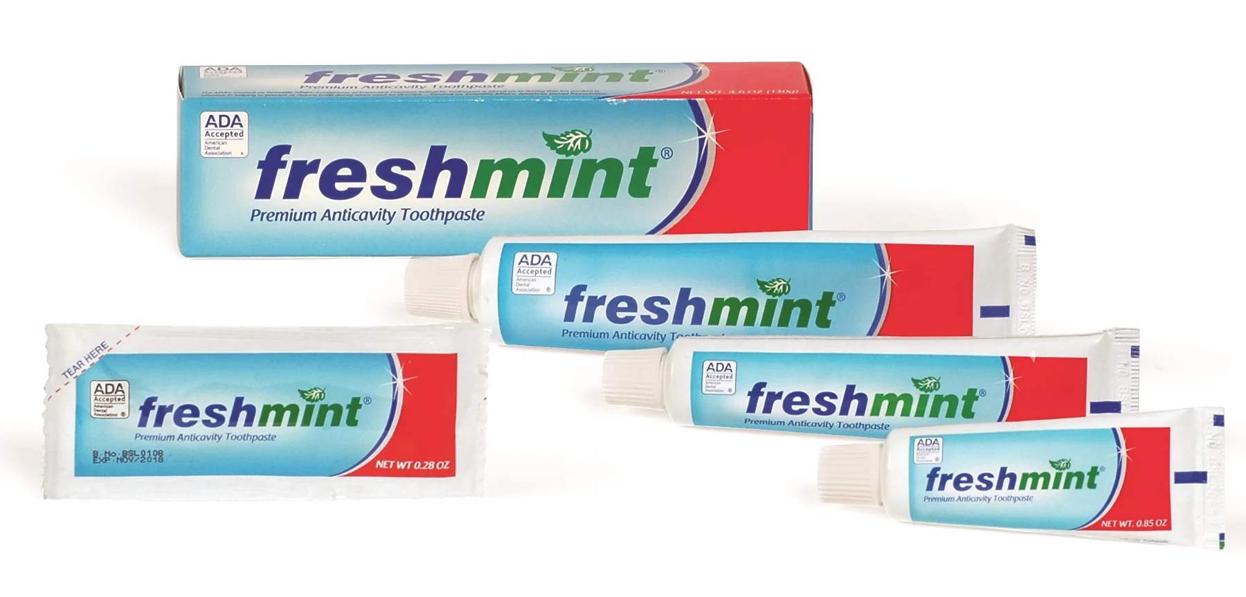 Three Freshmint premium anticavity toothpaste tubes lying together
